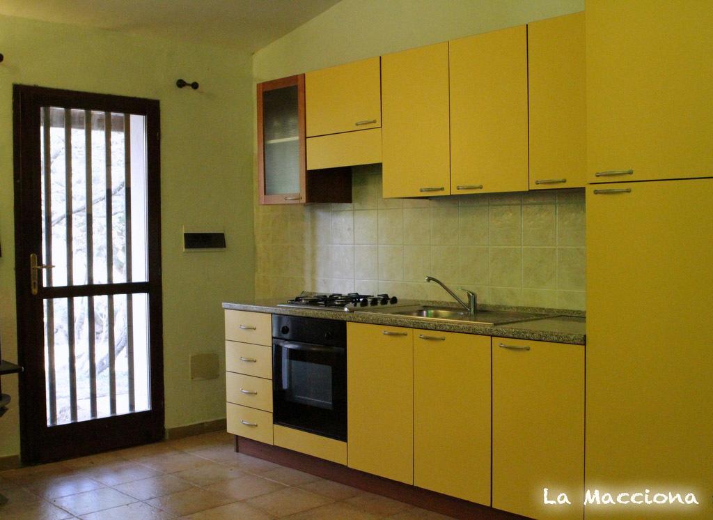 Apartamento La Macciona Aglientu Habitación foto